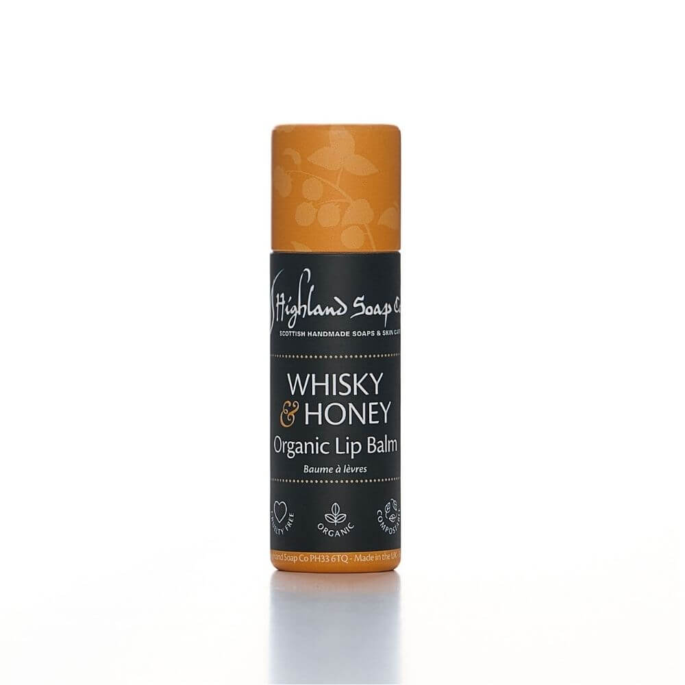 Whisky & Honey lippenbalsem van The Highland Soap Company op een lichte achtergrond.