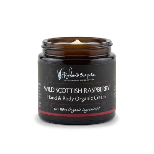 Wild Scottish Raspberry Hand & Body Cream 120 ml, open pot, van The Highland Soap Company op een witte achtergrond